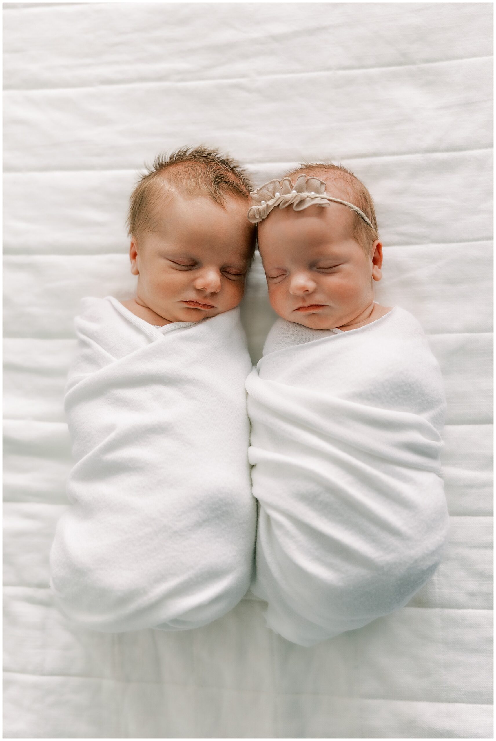 twin newborn babies on beanbag