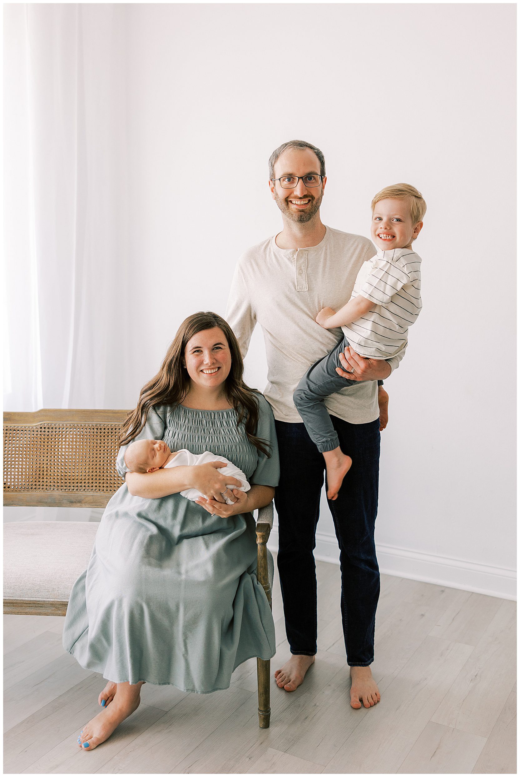 whole family smiling at camera