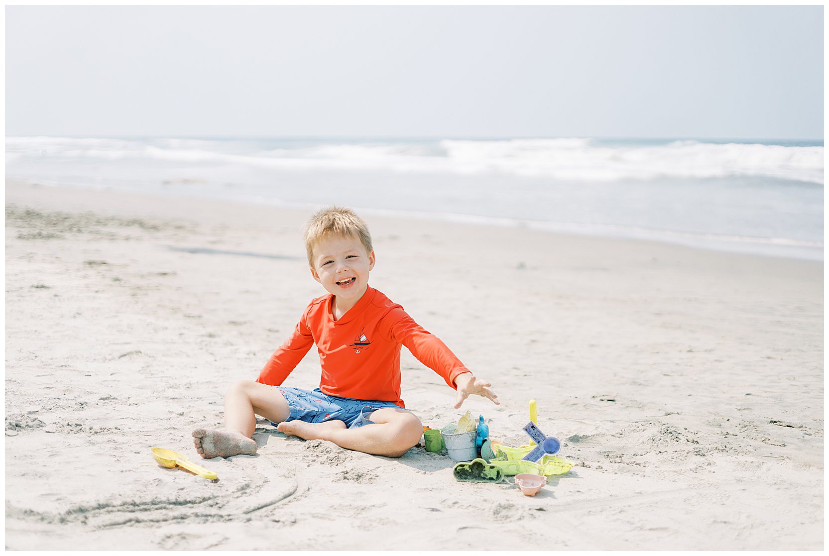 boy building a sand castle