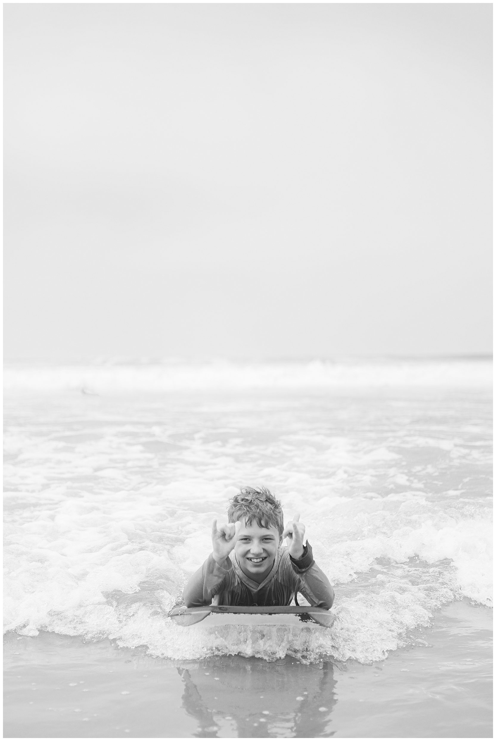 boys playing at beach