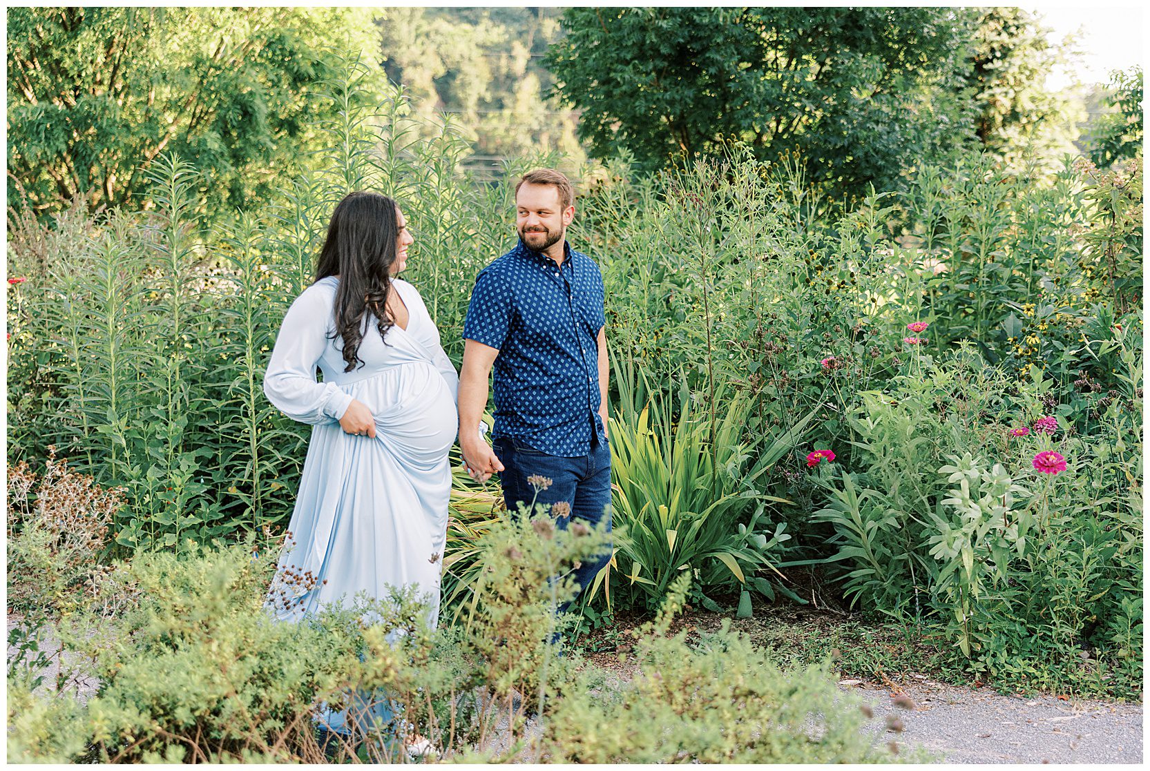 couple walking through gardens