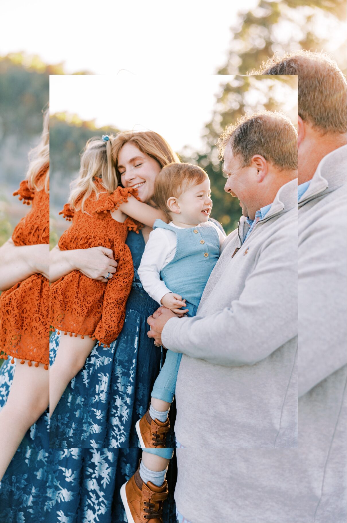 family holding and looking at one another