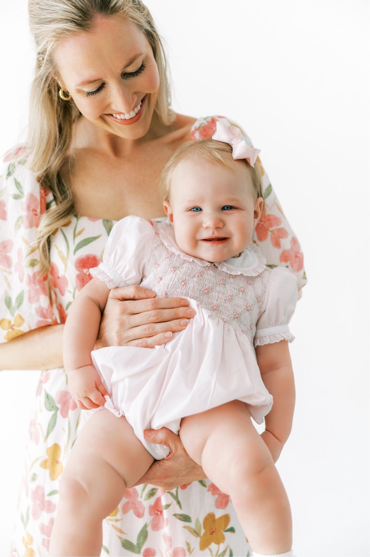 mom and baby smiling 