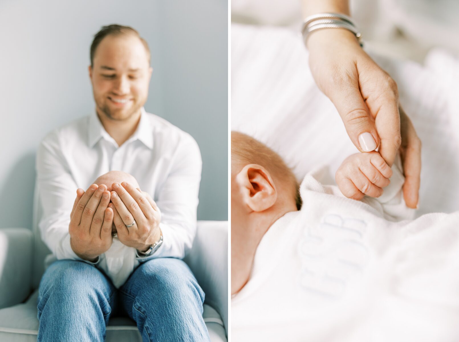 dad holding baby, mom finger wrapped around baby hand
