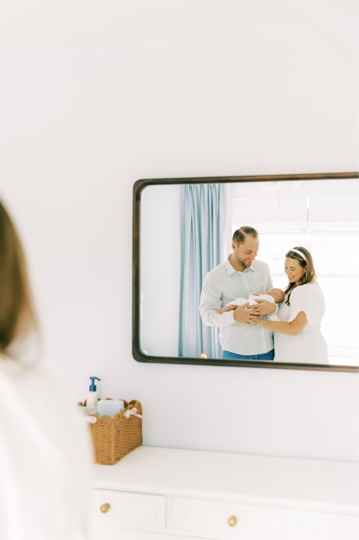 family pictured threw the mirror