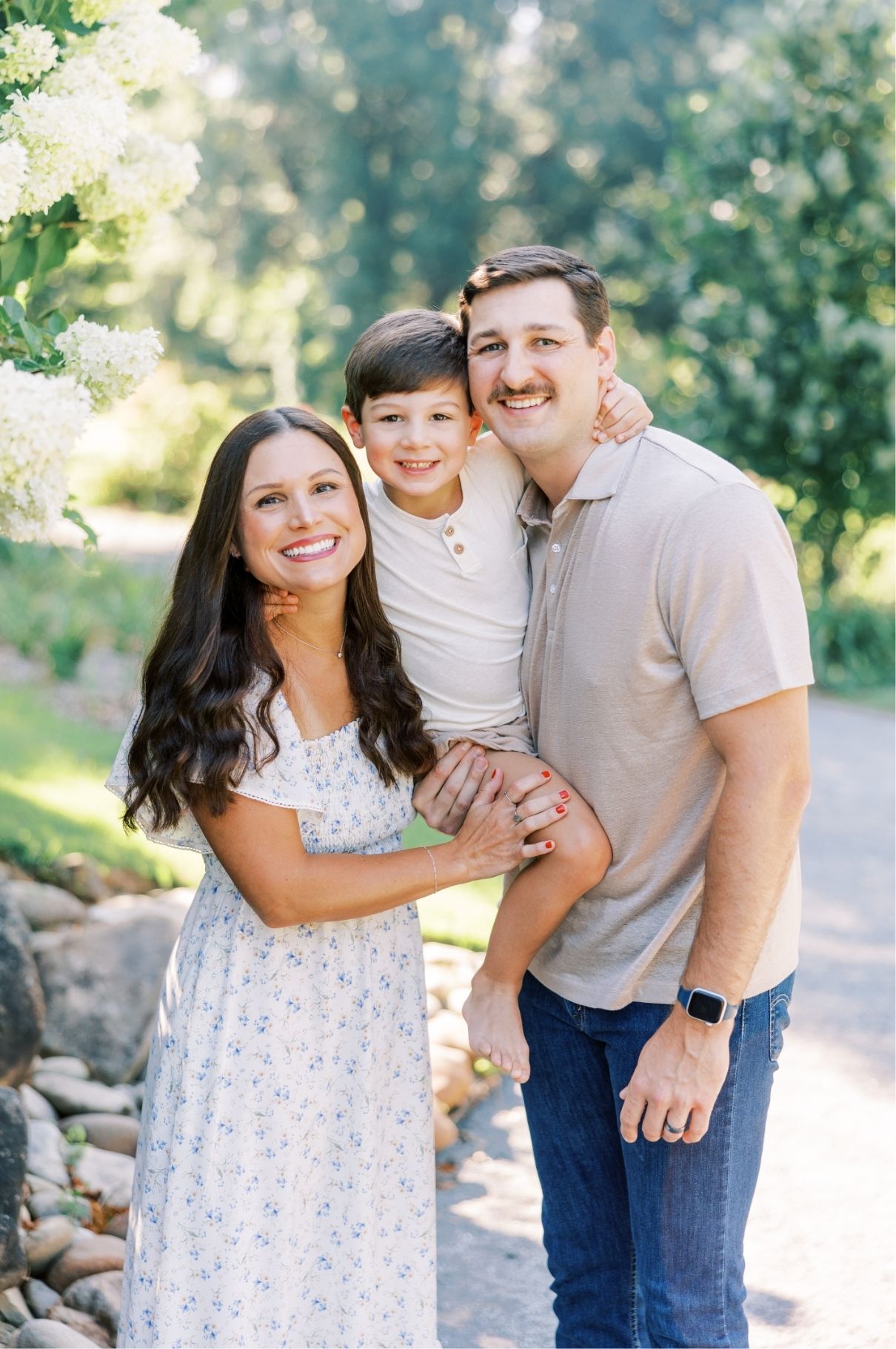 all three smiling at camera