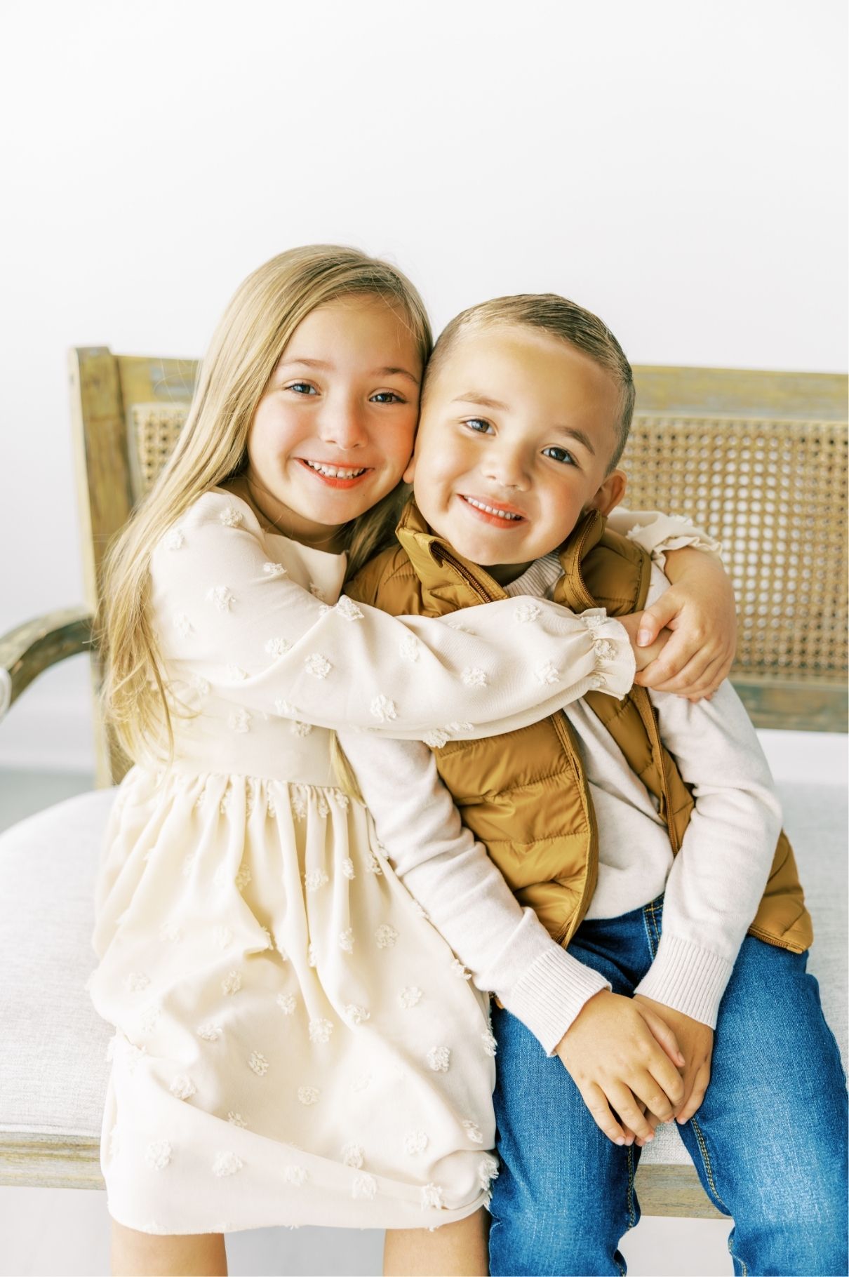 brother and sister hugging