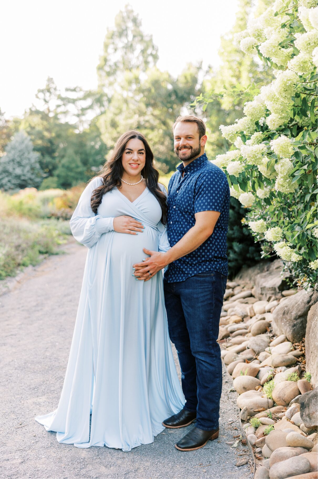 mom and dad smiling at camera