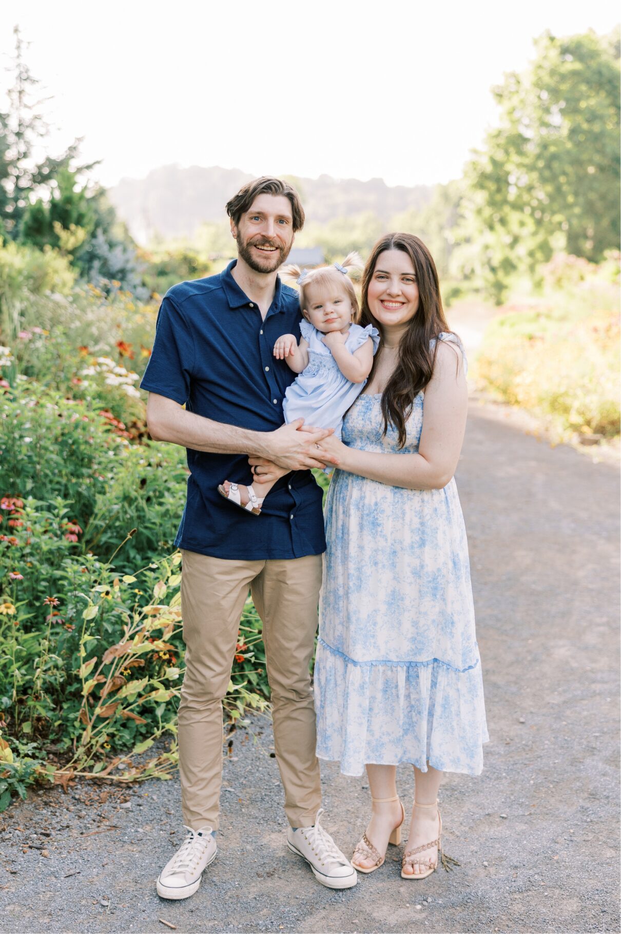 family smiling at camera