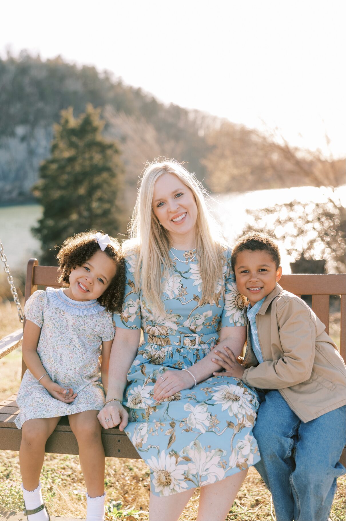 mom and kids on swing