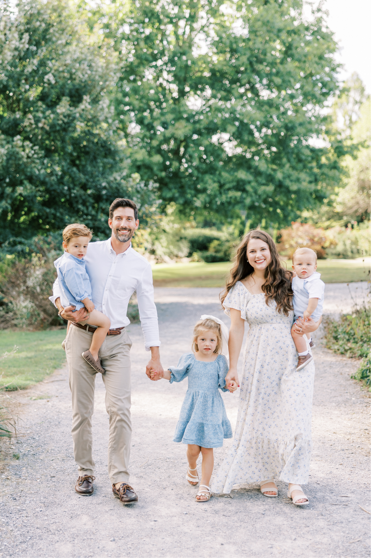 family walking smiling at camera