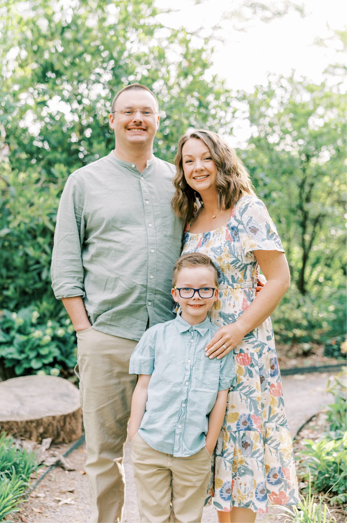 family smiling at camera